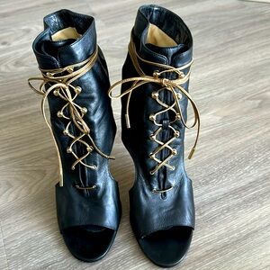 Jimmy Choo black 4 inch stiletto lace up booties with gold laces. size 40.